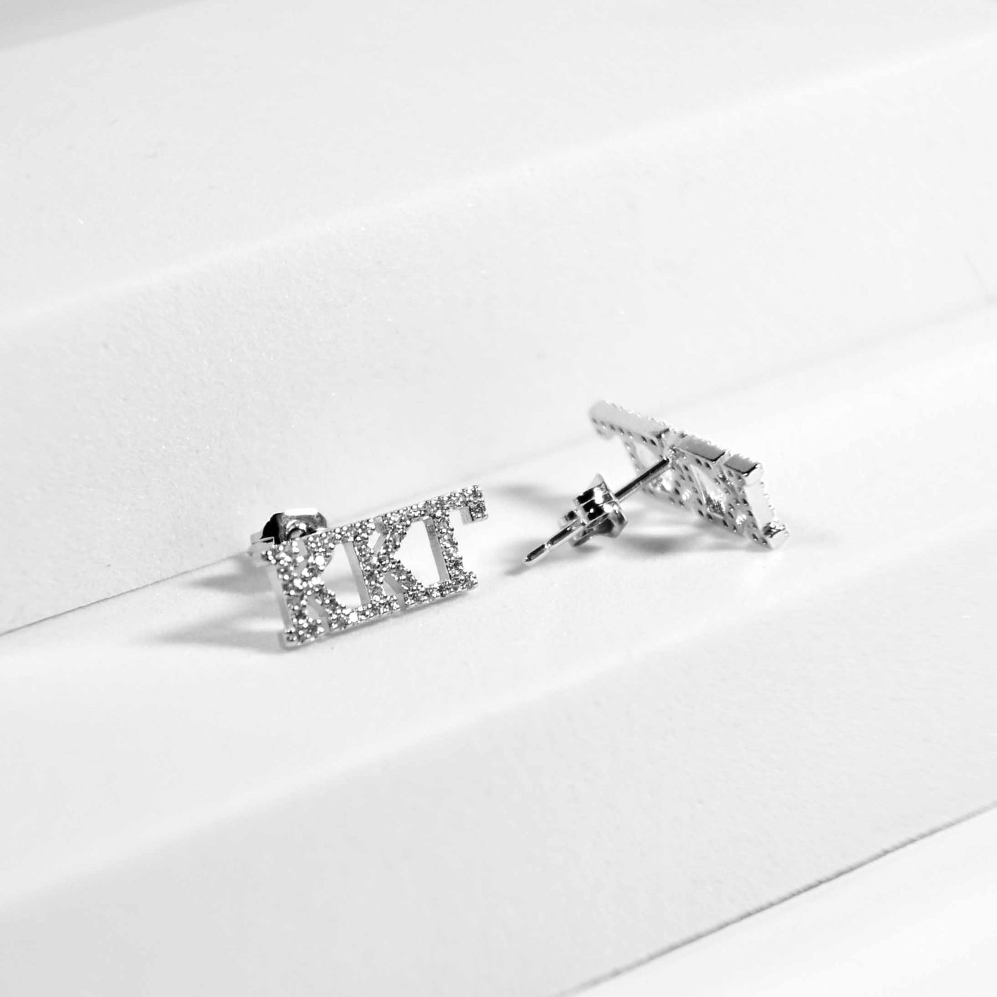 Delta Phi Epsilon White Gold Plated Stud Earrings