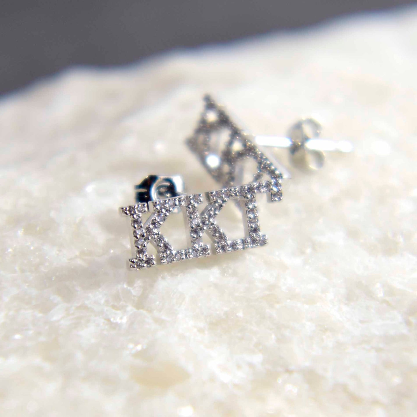 Delta Phi Epsilon White Gold Plated Stud Earrings